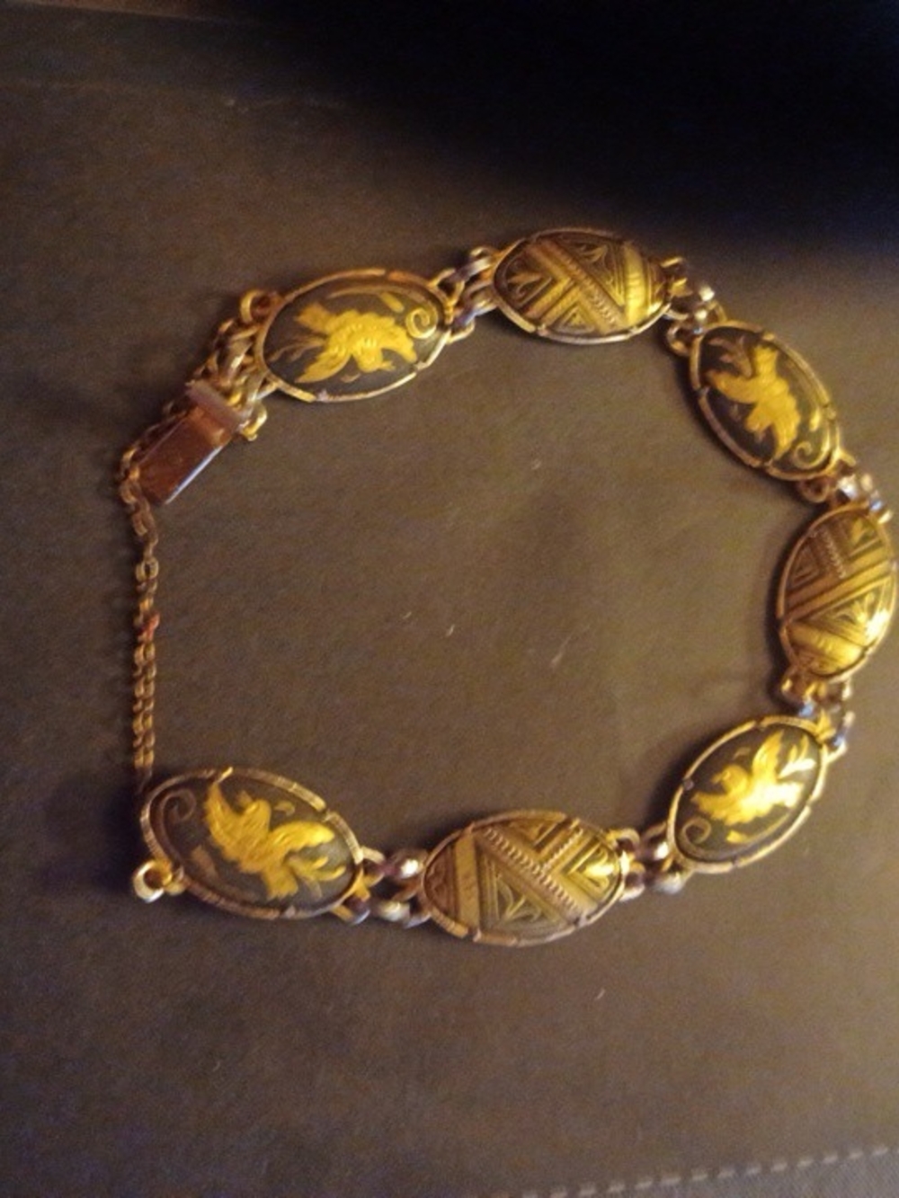 Gold-Tone Oval Link Bracelet with Floral Motif